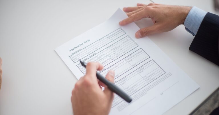 someone filling out a job application