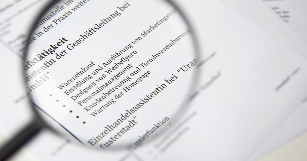 Close-up of a computer screen displaying resume text being scanned