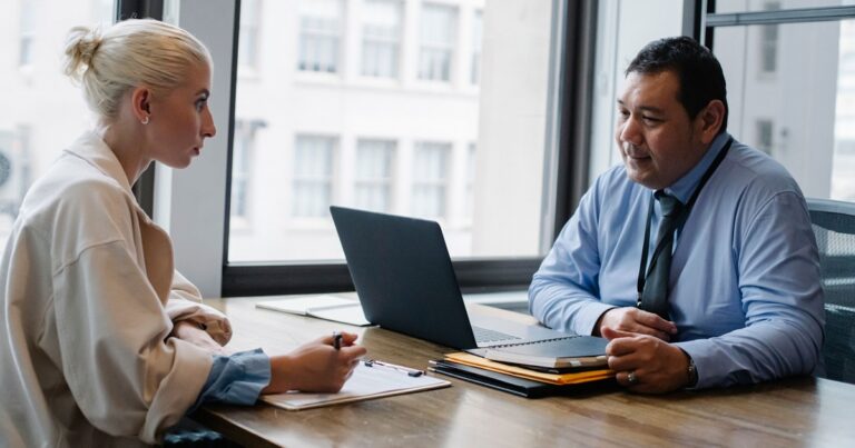 Two people in conversation during a job interview